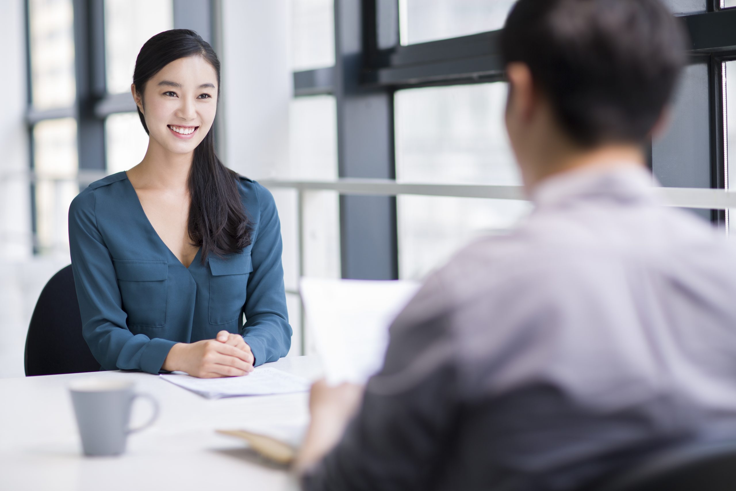 young chinese woman interviewing for a job